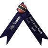 funeral ribbon with badge